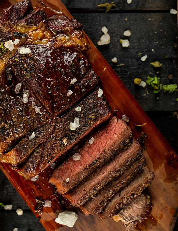 Fire-finished beef at Can Bestia